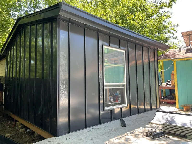 Black standing seam metal wall panels for Roof Inspection in Grambling